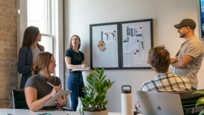 a group of people sitting around a table